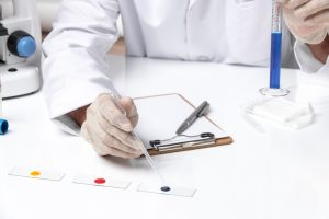 front close view male doctor white medical suit white desk